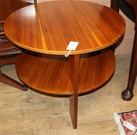 A 1940s modernist coffee table, with a utility furniture stamp to the underside. Diameter 61cm